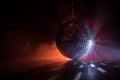 Colorful disco mirror ball lights night club background. Party lights disco ball. Selective focus Royalty Free Stock Photo