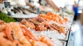 Colorful display of fresh fish and seafood on ice at lively market, showcasing marine delicacies Royalty Free Stock Photo
