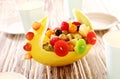 Colorful display of fresh fruit salad in a boat