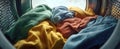 The colorful display of freshly washed clothes inside a washing machine..AI generated image Royalty Free Stock Photo