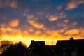 Colorful display of mammatus clouds at sunset Royalty Free Stock Photo