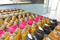 Colorful display of pastries topped with fruits in a French patisserie