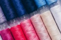 A Colorful Display of Spools of Thread in Various Shades, Perfect for Sewing, Crafting, and Textile Projects Royalty Free Stock Photo