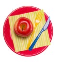 Colorful disposable plates, plastic and fork, apple, napkin isolated.