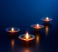 Colorful diya lamps lit during diwali celebration