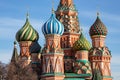 Colorful domes of St. Basil`s Cathedral on a background of blue sky. Moscow, Russia Royalty Free Stock Photo