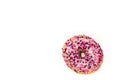 Colorful donut isolated on white.  Sweet icing sugar food with glazed sprinkles, doughnut with frosting. Top view with copy space Royalty Free Stock Photo