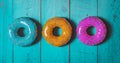 Colorful donuts assorted donuts with chocolate frosted, pink glazed and sprinkles donuts Royalty Free Stock Photo