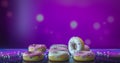 Colorful donuts assorted donuts with chocolate frosted, pink glazed and sprinkles donuts Royalty Free Stock Photo