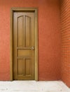 A colorful doorway with a vintage wooden door