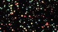 Colorful dots of light moving slowly on black background bokeh. Animation. Flying from the bokeh cloud with many small Royalty Free Stock Photo