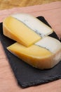 Colorful Double Dutch cheese, hard cheese made from cow milk and goat milk with layer of black mold inside