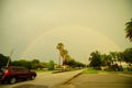 Colorful double rainbow at sun set Royalty Free Stock Photo