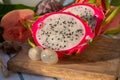 Colorful dragon fruit and peeled lychees, tasty tropical exotic fruits close up