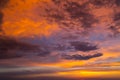 colorful dramatic red orange sunset dawn cloudy sky Royalty Free Stock Photo