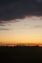 Colorful dramatic sky with cloud at sunset over fields and forest near Kyiv, Ukraine Royalty Free Stock Photo