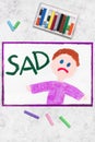 Drawing: Sad boy and word SAD Royalty Free Stock Photo