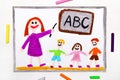 Colorful drawing: teacher and students in the classroom.