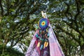 colorful dream catcher on top of teepee trent