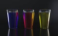 Colorful drinks on black background.