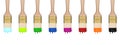 Colorful dropping set of paint brushes in a row