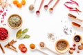 Colorful dry herbs and spices for cooking food white kitchen table background top view space for text Royalty Free Stock Photo