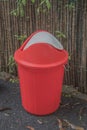 Colorful Dustbin in the garden Royalty Free Stock Photo