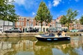 Colorful dutch historic houses and boat on canal