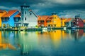 Colorful dutch wooden houses on water, Groningen, Netherlands, Europe Royalty Free Stock Photo