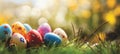 Colorful easter banner with beautiful eggs, sun rays, and copy space for text placement