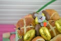 Golden foil chocolate Easter eggs with cute Easter bunny decoration