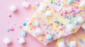 Colorful Easter Candy and Marshmallows on Pink Frosting Background Royalty Free Stock Photo