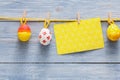 Colorful easter card and garland on wood background Royalty Free Stock Photo