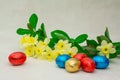 Colorful Easter chocolate eggs and flowers Royalty Free Stock Photo