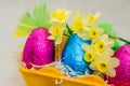 Colorful Easter chocolate eggs and flowers Royalty Free Stock Photo