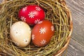Colorful easter egg in the basket Royalty Free Stock Photo