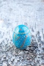 Colorful easter egg on blue wooden table Royalty Free Stock Photo