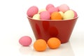 Colorful easter egg candy in a red bowl Royalty Free Stock Photo