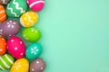 Colorful Easter Egg side border against a turquoise green background