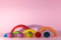 colorful Easter eggs above colorful plastic toy, creative holiday design, children toy Royalty Free Stock Photo