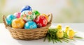 Colorful Easter Eggs in Basket with Fluffy Chicks Royalty Free Stock Photo