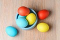 Colorful Easter eggs in a blue bowl. Easter eggs are a symbol and a mandatory attribute of Easter Royalty Free Stock Photo