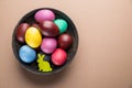 Colorful Easter eggs in bowl. Attribute of Easter celebration Royalty Free Stock Photo