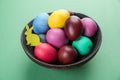 Colorful Easter eggs in bowl. Attribute of Easter celebration