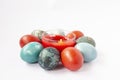 Colorful Easter eggs and burning wax candle. Traditional festive decor