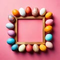 Colorful Easter eggs in a circle around a gold frame on pink Royalty Free Stock Photo