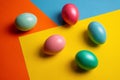 Colorful easter eggs on color block background Royalty Free Stock Photo