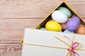 Colorful Easter Eggs decorated in beautiful giftbox