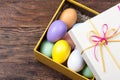 Colorful Easter Eggs decorated in beautiful giftbox