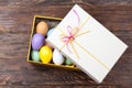 Colorful Easter Eggs decorated in beautiful giftbox